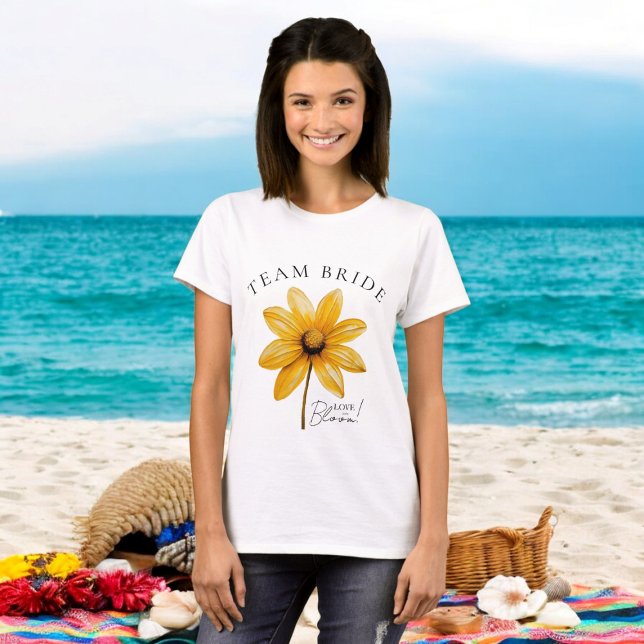 Love is in bloom minimal floral bridal shower  T-Shirt (team bride tshirt with a beautiful yellow flower and typogrpahy saying love in bloom!)