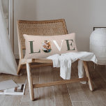 Love Joy Modern Type Geometric Family Photo Pink Lumbar Cushion<br><div class="desc">Modern and stylish Christmas theme love throw pillow design. The design features the word "LOVE" with the letter "O" created with your own personalised family photo. Modern faux gold geometric concentric circle frames the photo. The reverse side features a modern faux gold geometric concentric circle pattern with Love & Joy....</div>