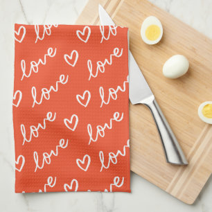 Love lettering & hearts drawing in red background tea towel