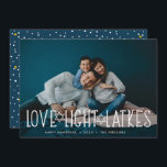 Love, Light & Latkes | Hanukkah Photo Card<br><div class="desc">Cute and lighthearted Hanukkah photo card features your favorite horizontal or landscape oriented photo with "love,  light,  latkes" overlaid in white lettering accented with stars of David. Personalize with your Hanukkah greeting,  names and the year beneath. Cards reverse to a pattern of snow and stars on dark blue.</div>