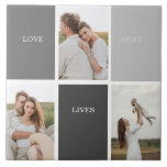 Love Lives Here | Three Photo Family Gift Ceramic Tile<br><div class="desc">Presenting a heartwarming and personalised gift that celebrates the essence of family, featuring a beautiful grey frame adorned with a touching "Love Lives Here" quote and three cherished photos. Every time the recipient catches a glimpse of this remarkable gift, their heart will be filled with fond memories and a profound...</div>