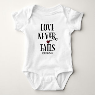 Love Never Fails Christian   Bible Verse Baby Bodysuit