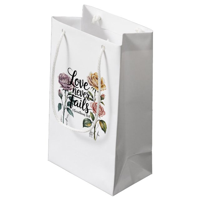 “Love Never Fails Floral Scripture Design Small Gift Bag (Back Angled)