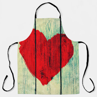 Love symbol on old wooden wall apron