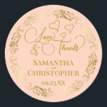 Love & Thanks Elegant Blush Peach & Gold Wedding Classic Round Sticker<br><div class="desc">These beautiful peach coloured stickers are designed to use as wedding favour tags, or as envelope seals for your wedding thank you cards. The elegant design features an ornate lacy golden border with fancy script lettering reading "Love & Thanks!" There are romantic hearts scattered about with room for the names...</div>