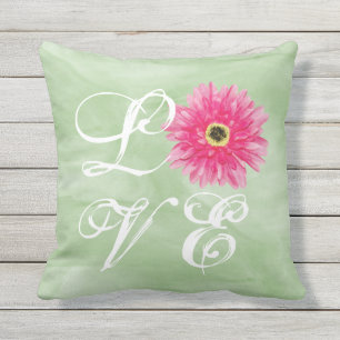 LOVE Typography Pink Gerbera Daisy Flower on Green Cushion