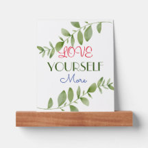Love Yourself More green leaves motivational quote
