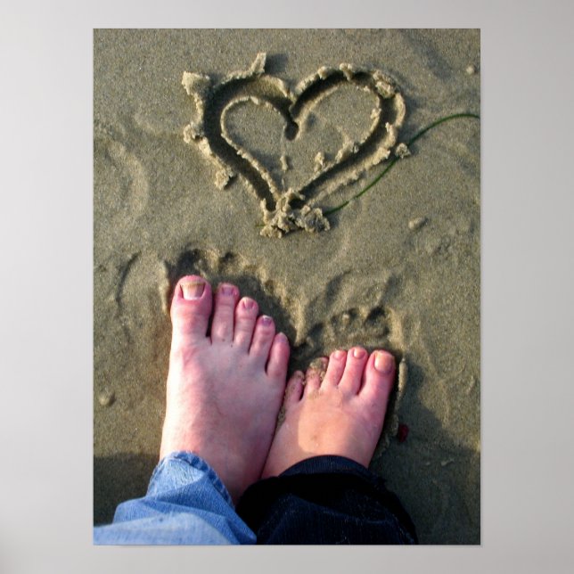 Lovebirds make heart in sand by ocean in poster (Front)