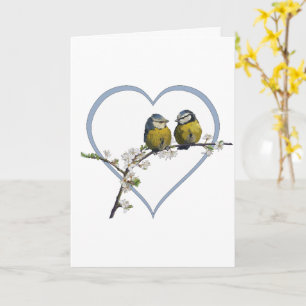 Lovebirds sitting on a cherry blossom branch heart card