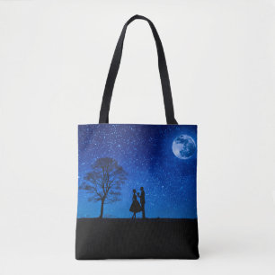 Lovers under a full moon tote bag