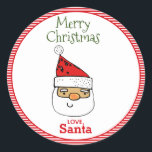 LoveSanta Whimsical Santa With Hat Christmas Classic Round Sticker<br><div class="desc">This festive Christmas sticker is perfect for gifts from Santa! Sticker features Santa's face with a red Santa hat and "Merry Christmas Love Santa" in whimsical typography on a red and white candy stripe background. Design by T.K. Goforth. Other items with this design can be found in my Vintage Red...</div>
