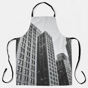 LOW ANGLE GRAYSCALE PHOTOGRAPHY OF HIGH-RISE BUILD APRON