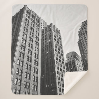 LOW ANGLE GRAYSCALE PHOTOGRAPHY OF HIGH-RISE BUILD SHERPA BLANKET