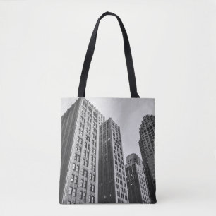 LOW ANGLE GRAYSCALE PHOTOGRAPHY OF HIGH-RISE BUILD TOTE BAG