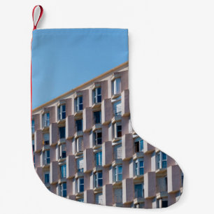 LOW ANGLE PHOTO OF GRAY CONCRETE BUILDING SMALL CHRISTMAS STOCKING