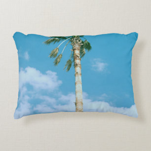 Low-angle photo of palm trees under blue sky decorative cushion