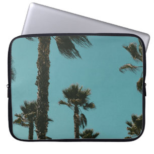 Low angle photo of trees in the morning laptop sleeve