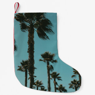 Low angle photo of trees in the morning small christmas stocking