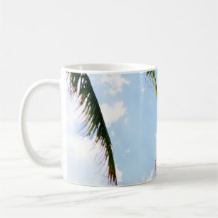 Low angle photo of white and orange concrete build coffee mug
