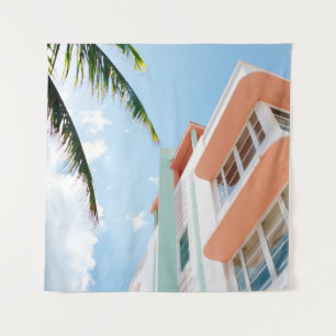 Low angle photo of white and orange concrete build tapestry
