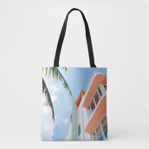 Low angle photo of white and orange concrete build tote bag