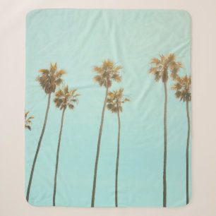 Low angle photography coconut tree sherpa blanket