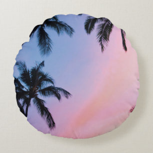 Low-angle photography coconut trees during golden round cushion