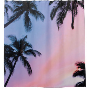 Low-angle photography coconut trees during golden shower curtain