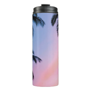 Low-angle photography coconut trees during golden  thermal tumbler