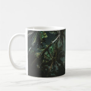 LOW ANGLE PHOTOGRAPHY OF A COCONUT TREES WITH STAR COFFEE MUG