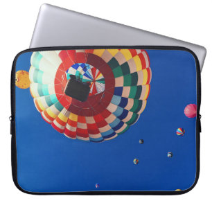 Low angle photography of balloons laptop sleeve