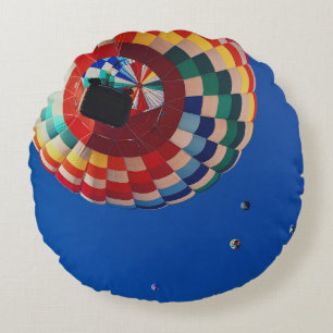 Low angle photography of balloons round cushion