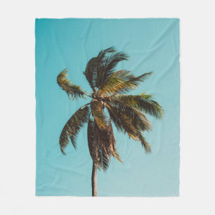 Low angle photography of coconut tree fleece blanket