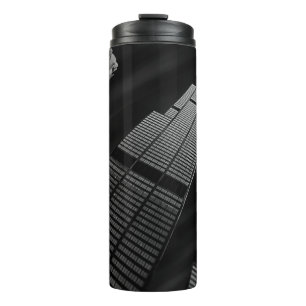 LOW-ANGLE PHOTOGRAPHY OF CURTAIN WALL BUILDING THERMAL TUMBLER
