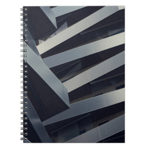 LOW ANGLE PHOTOGRAPHY OF GRAY BUILDING AT DAYTIME NOTEBOOK