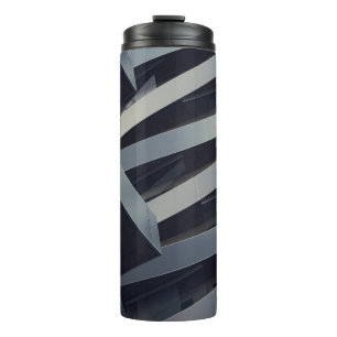 LOW ANGLE PHOTOGRAPHY OF GRAY BUILDING AT DAYTIME THERMAL TUMBLER
