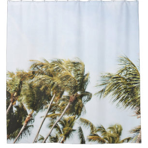 LOW-ANGLE PHOTOGRAPHY OF GREEN COCONUT TREES UNDER SHOWER CURTAIN
