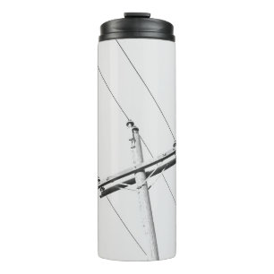 LOW-ANGLE PHOTOGRAPHY OF GREY ELECTRIC POST THERMAL TUMBLER