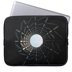 Low angle photography of missile silo hole laptop sleeve