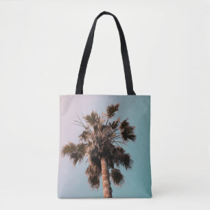 Low-angle photography of palm plant tote bag
