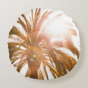 Low angle photography of palm tree round cushion