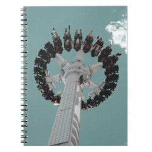 Low-angle photography of people riding a drop-down notebook