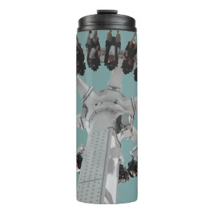 Low-angle photography of people riding a drop-down thermal tumbler