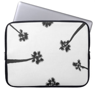 Low angle photography of six trees laptop sleeve