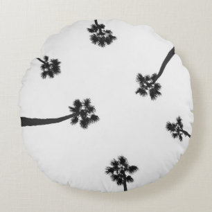 Low angle photography of six trees round cushion