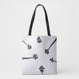 Low angle photography of six trees tote bag