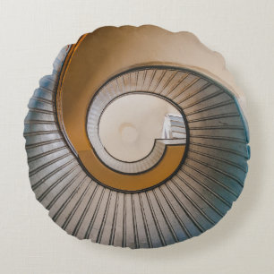 Low angle photography of spiral ladder round cushion