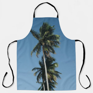 Low angle photography of three coconut trees apron