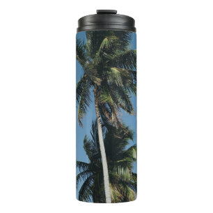 Low angle photography of three coconut trees thermal tumbler