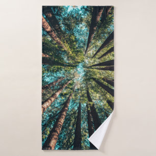 Low angle photography of trees at daytime bath towel